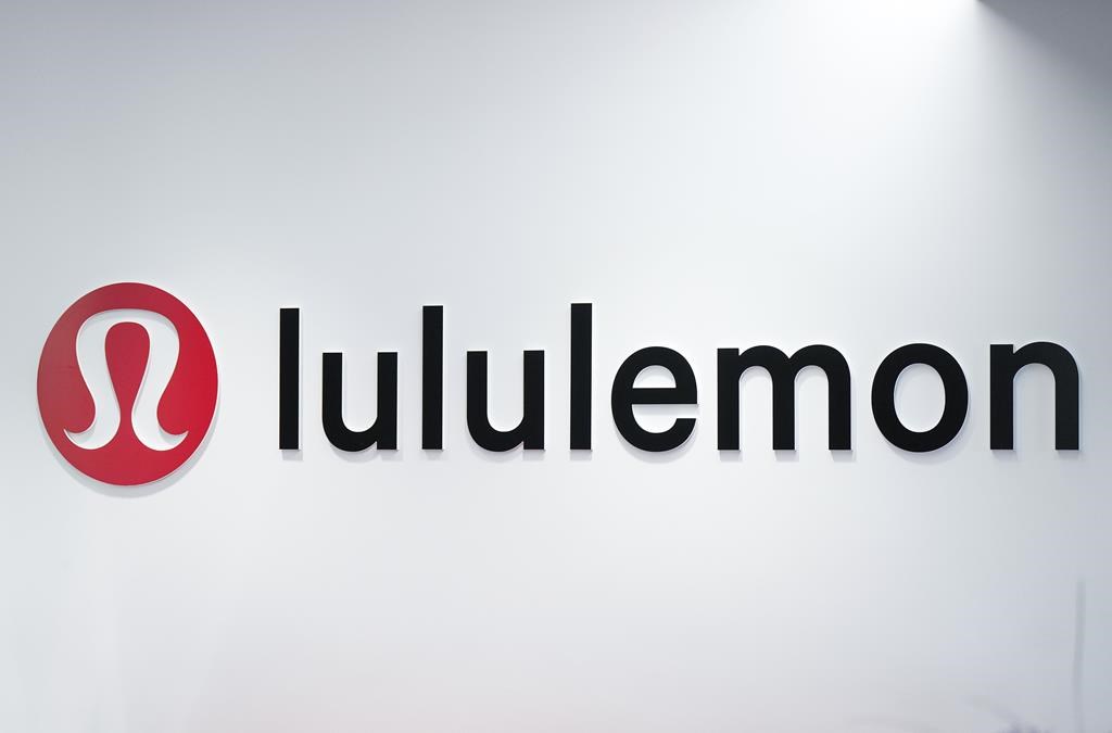 The Lululemon logo is seen on a wall at the company&#039;s headquarters, in Vancouver, on Thursday, May 25, 2023. 