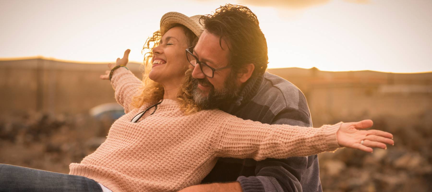 Happy adult people cheerful couple enjoy the outdoor leisure activity riding a bike