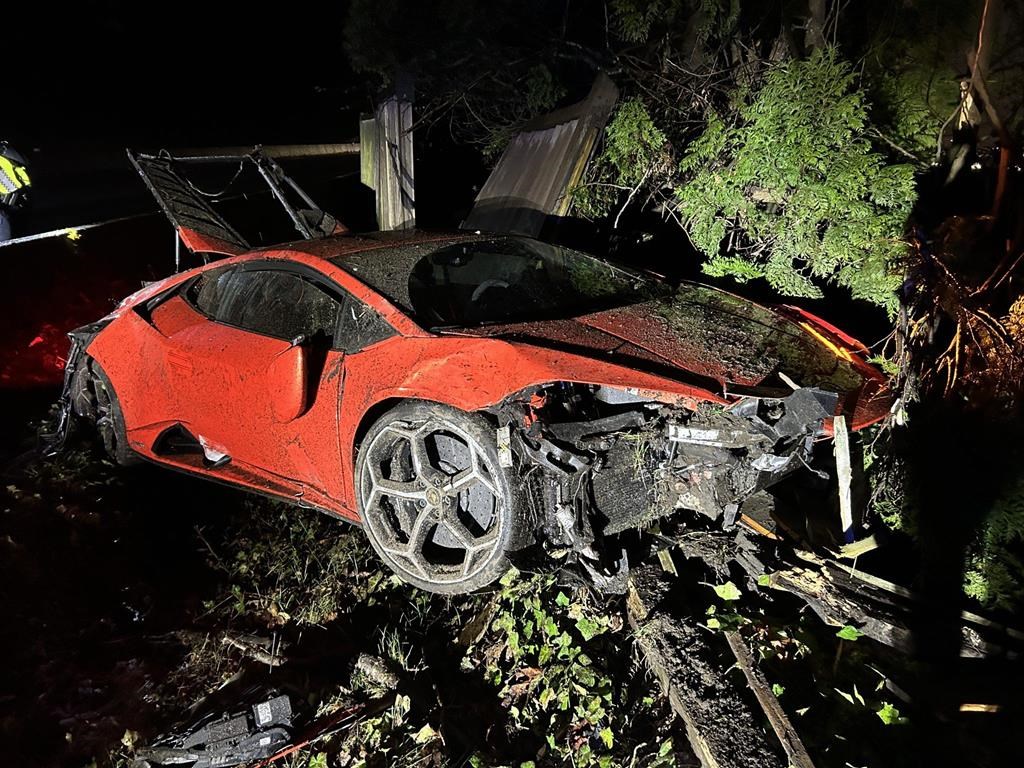 A crashed Lamborghini is shown in a West Vancouver Police handout photo. Police in West Vancouver say a &quot;joyride&quot; by a 13-year-old in a Lamborghini set off a single-vehicle crash that resulte