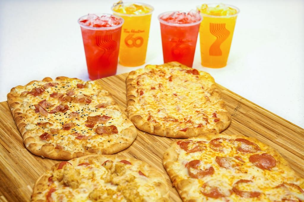 Tim Hortons new flatbread pizza products (clockwise from top left) Bacon Everything, Simply Cheese, Pepperoni, and Chicken Parmesan are photographed at the Tim Hortons test kitchen in Toronto