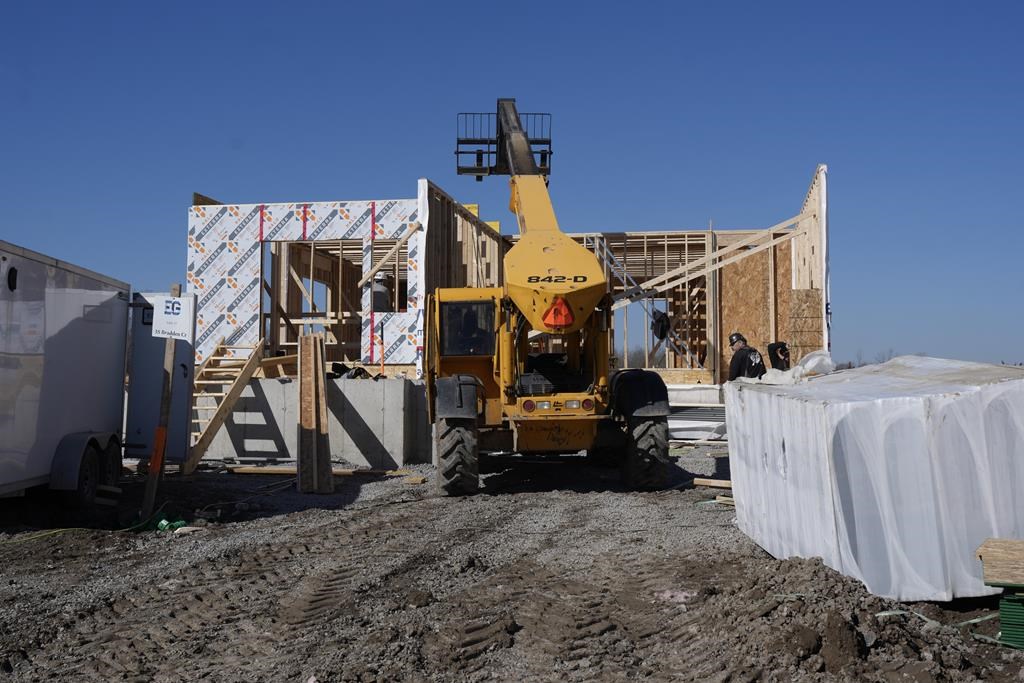 Canada Mortgage and Housing Corp. says the annual pace of housing starts in March declined seven per cent compared with February. Work continues at a new housing development in Belleville, On