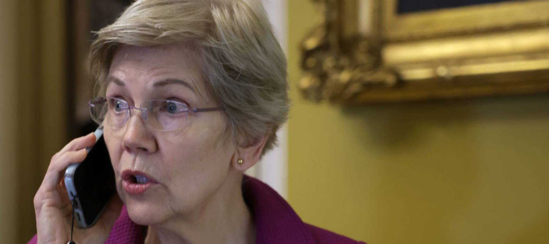 U.S. Sen. Elizabeth Warren (D-MA) talks on her phone prior to a weekly Democratic policy luncheon at the U.S. Capitol.