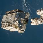 An external pallet packed with old nickel-hydrogen batteries is released from the International Space Station.