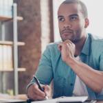 Skeptic, unsure, uncertain, doubts concept. Young african student is making decision sitting at the office in casual smart
