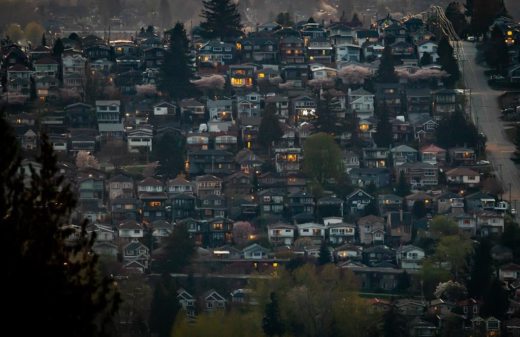 Houses are seen on a hillside in Burnaby, B.C., on Saturday, April 17, 2021. 