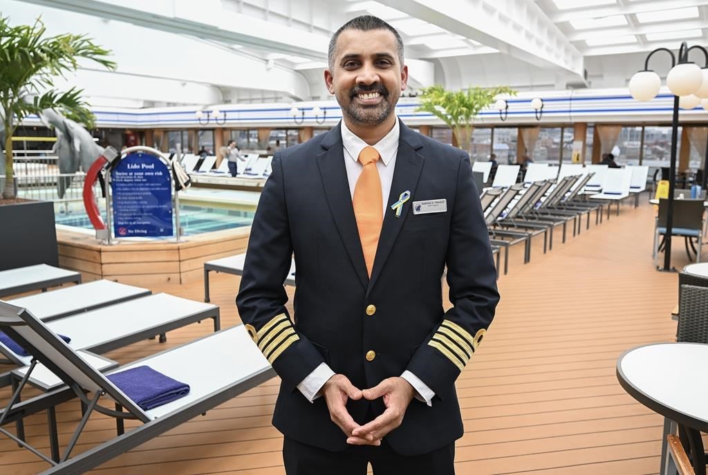 Rakesh Prasad, a staff captain with the Volendam cruise ship poses on board the ship in the Port of Montreal, Saturday, May 4, 2024. The cruise ship is the first to arrive in the port this ye