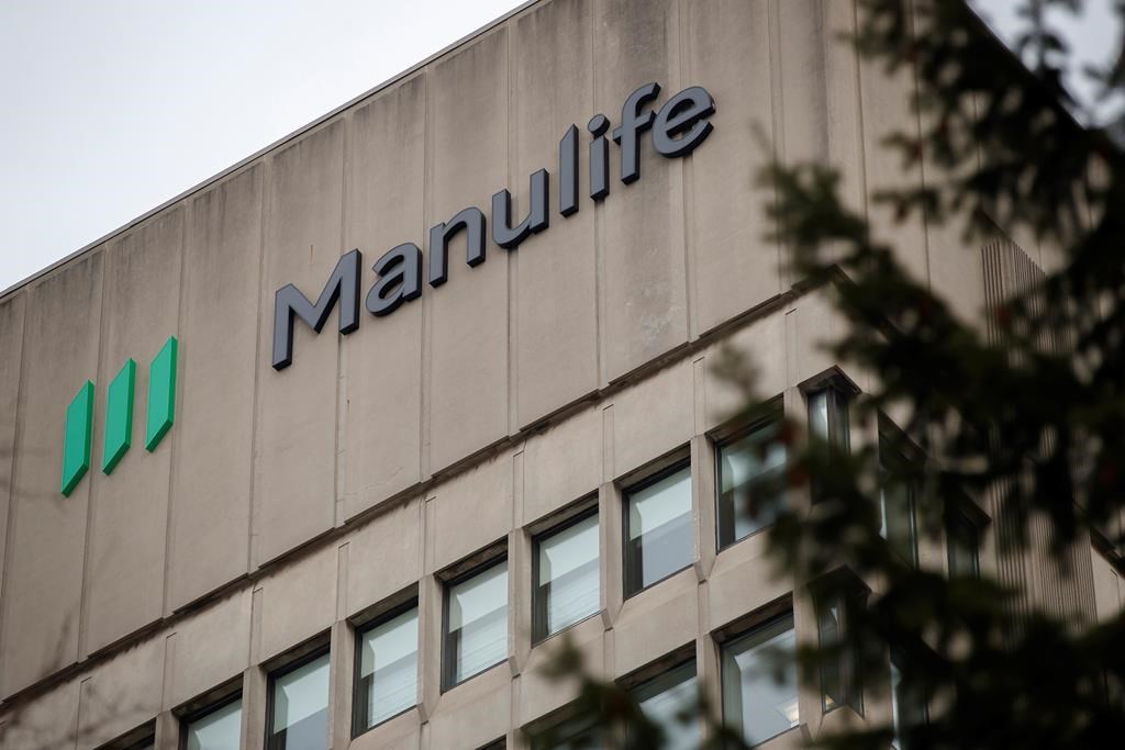 Signage is seen on Manulife Financial Corp.&#039;s office tower in Toronto, Tuesday, Feb. 11, 2020. 