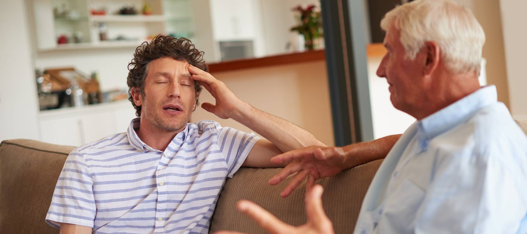 Shot of a man and his father having an argument.