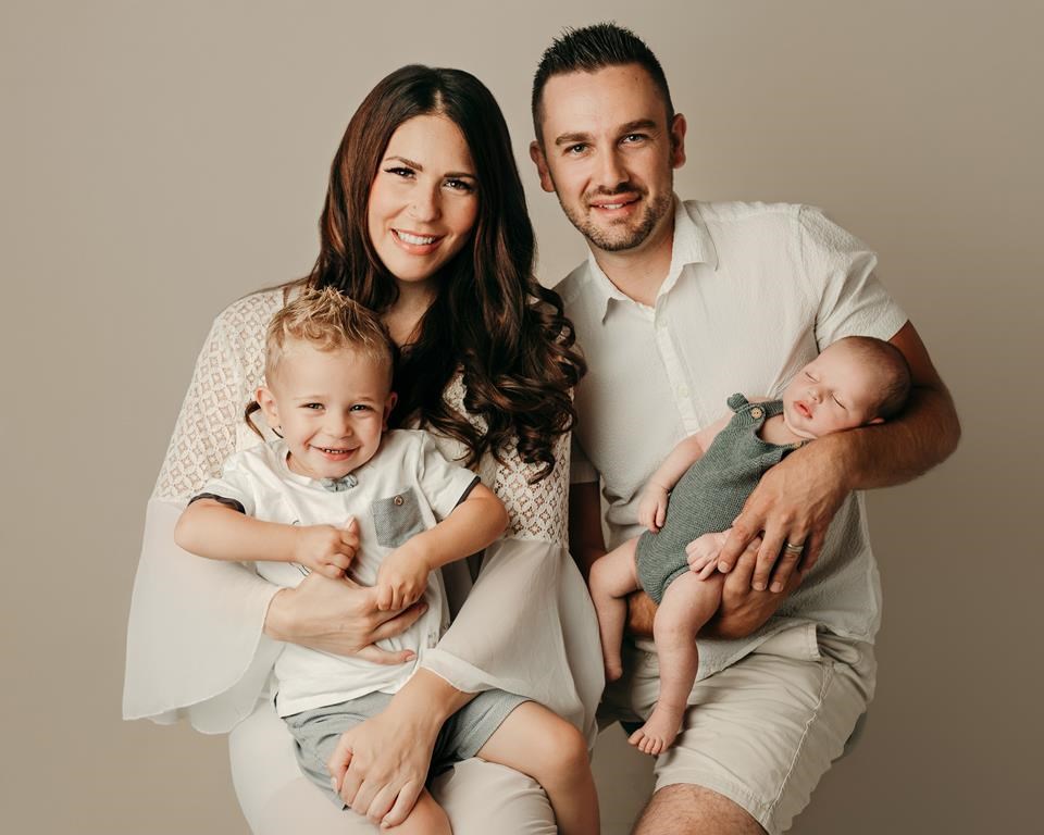 Kelsi Ribecco poses with her husband Marco and children Lisandro, right, and Alessio in this handout image. There are many reasons to start a family later in life. But fertility decreases as 