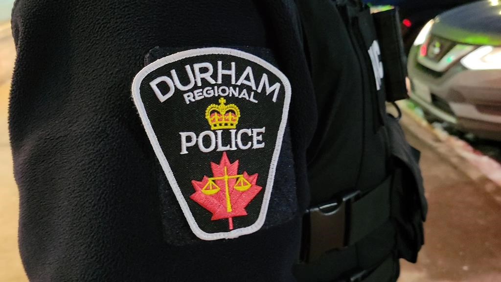 A Durham Regional Police officer&#039;s logo emblem is shown in Bowmanville, Ont. on Tuesday Feb. 28, 2023. Durham Regional police say they have arrested self-styled &#039;Crypto King&#039; Aiden Pleterski 
