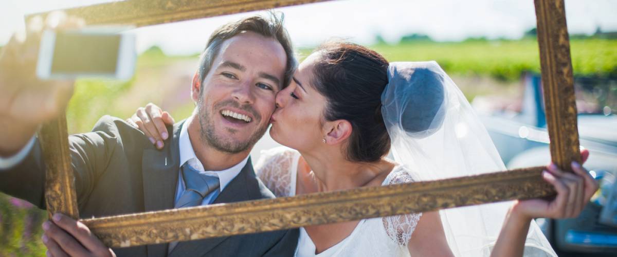 bride and groom kiss