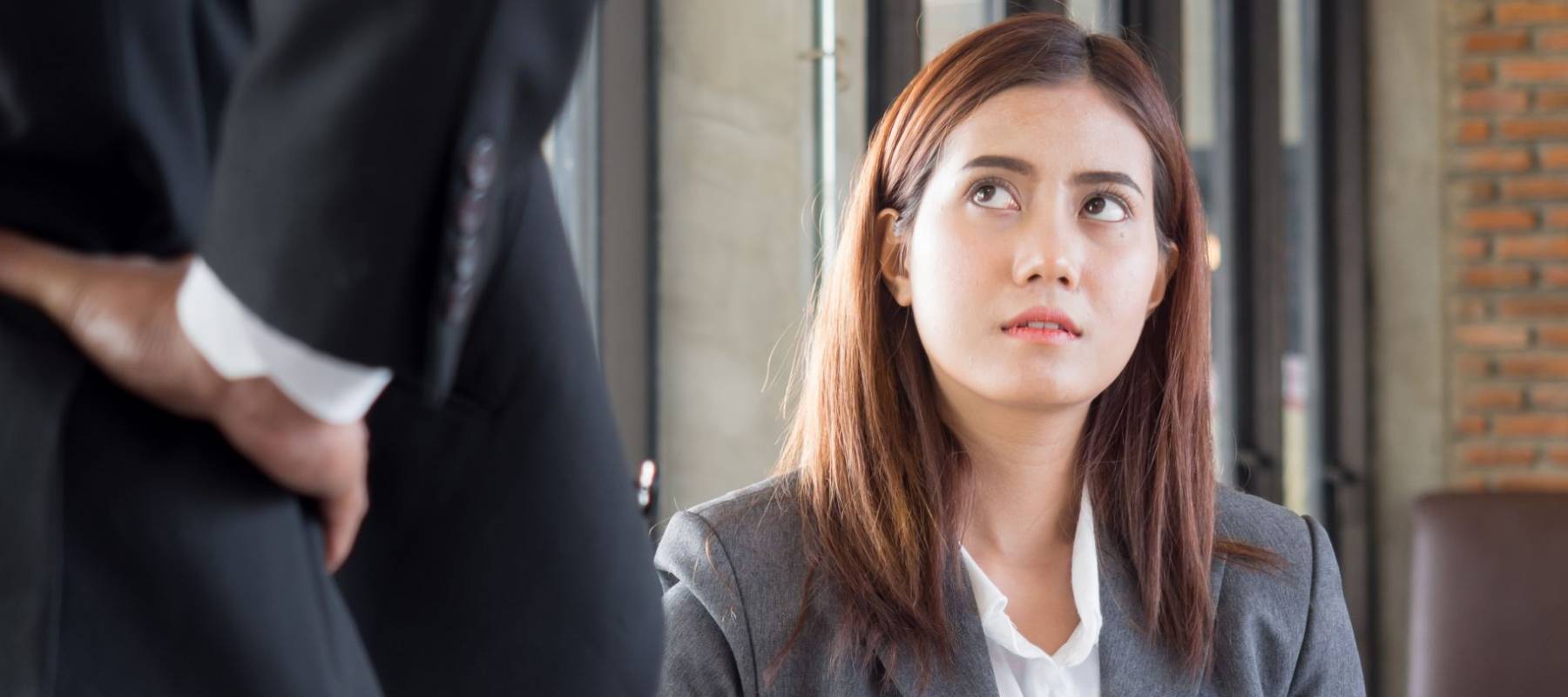 Aggressive/angry boss complaining to business woman