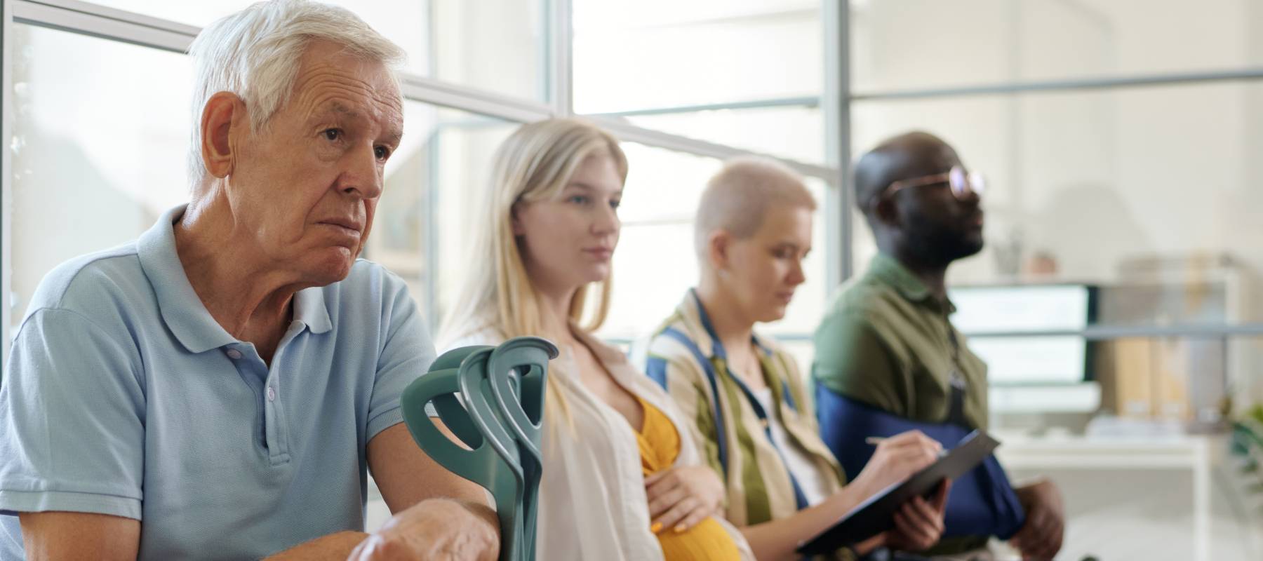 A lineup of folks await medical attention.