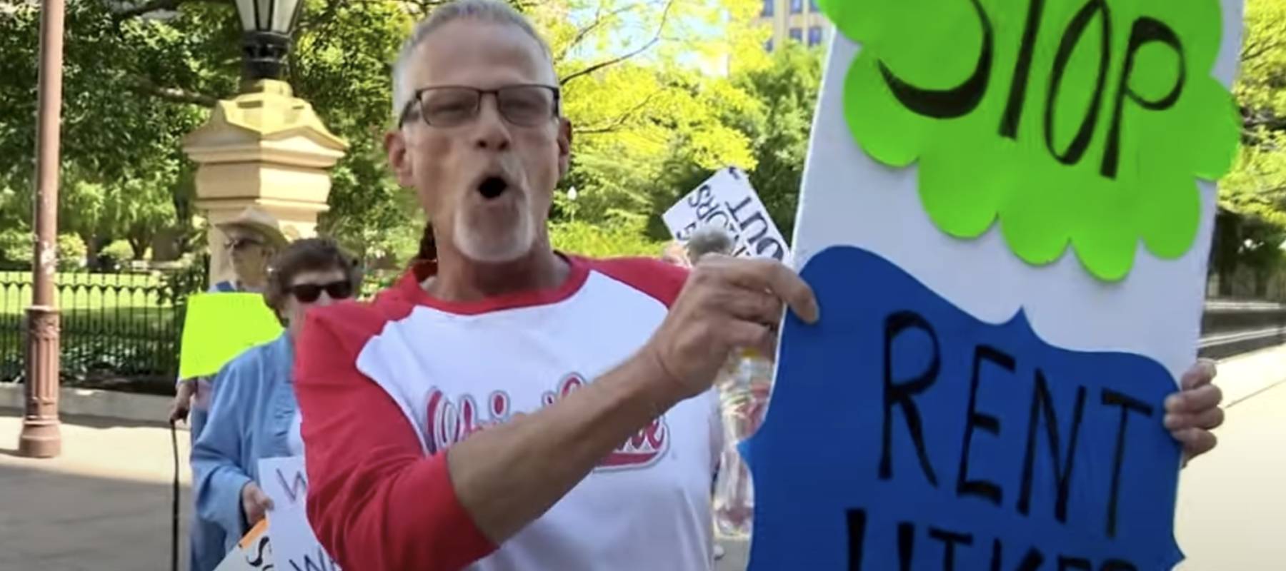 A small group of seniors demand the return of rent control outside the Ohio Statehouse.