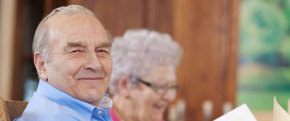 Elderly man sitting at a restaurant