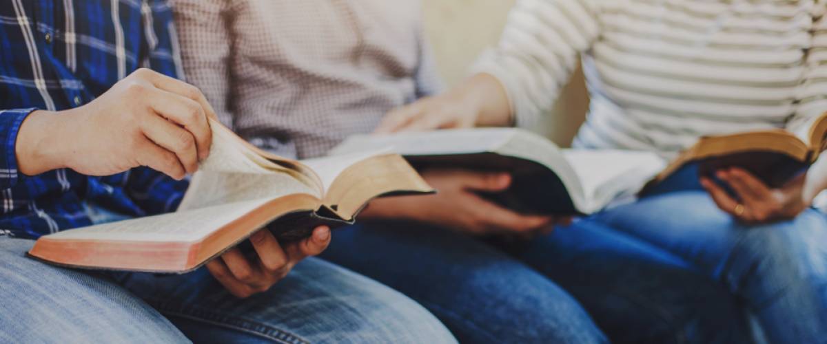 two people reading the bible