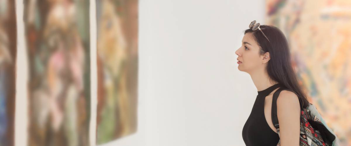 woman  looking at art