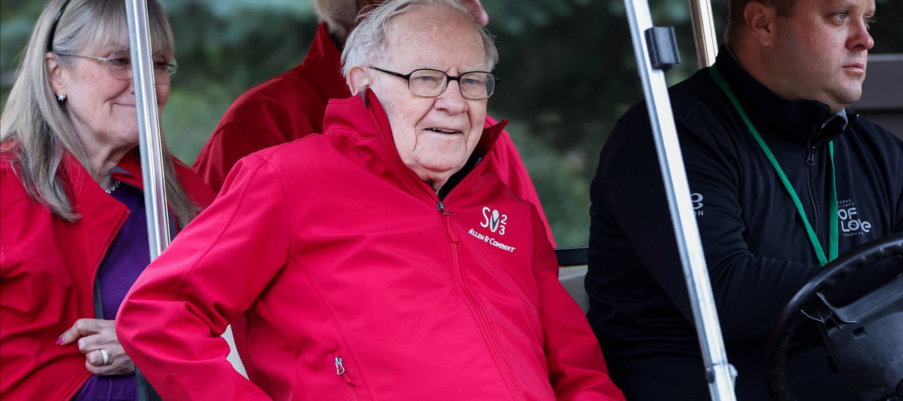 Warren Buffett in a golf cart.