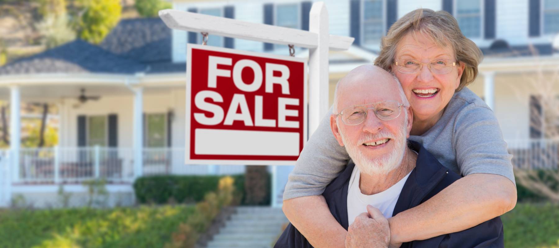 Senior couple selling home