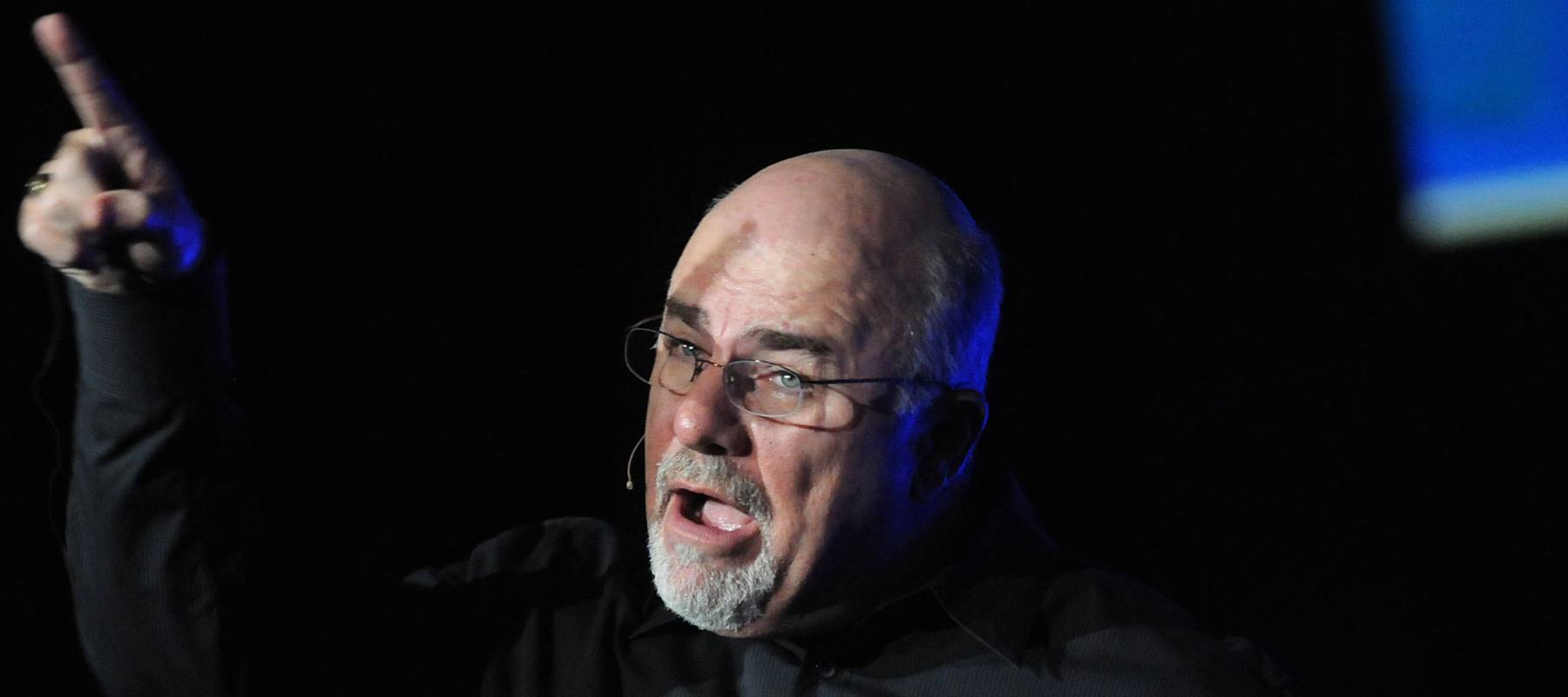 Personal finance guru Dave Ramsey speaks to a crowd of thousands at his event 'Dave Ramsey's Total Money Makeover LIVE'