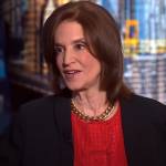 Woman on set of Bloomberg television, speaking expressively.