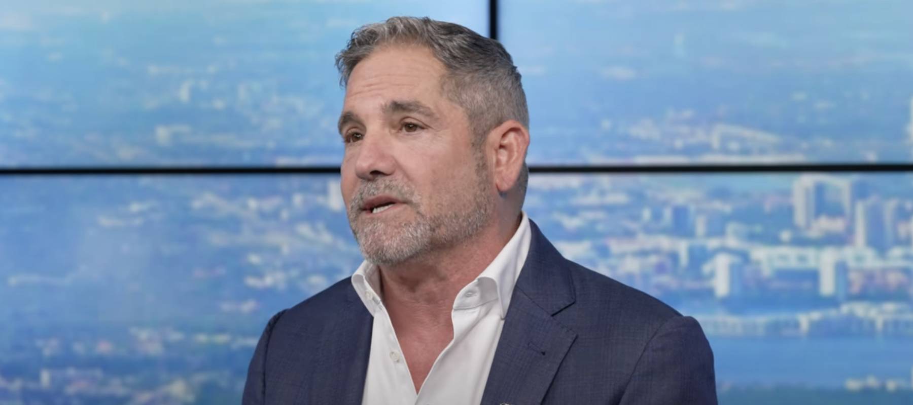 Grant Cardone speaking on television set