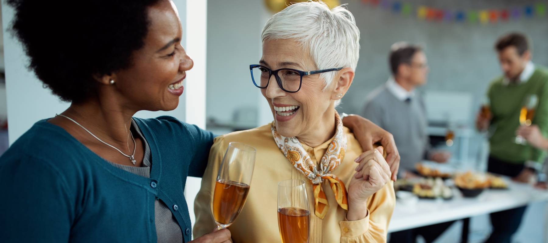 Office retirement party for older female staff member.