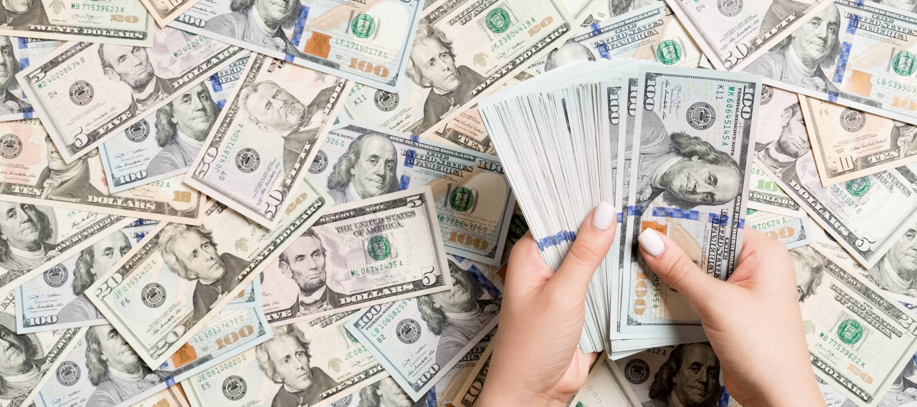 A person counting cash.