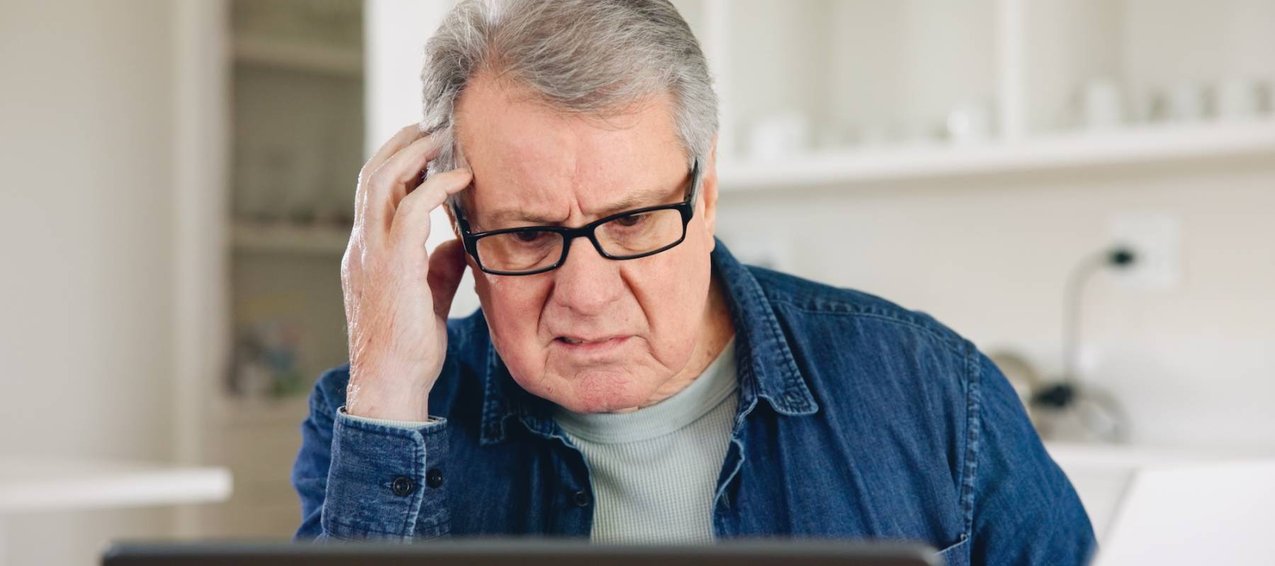 Stress, laptop or elderly man planning for financial spreadsheet or retirement investment in home.