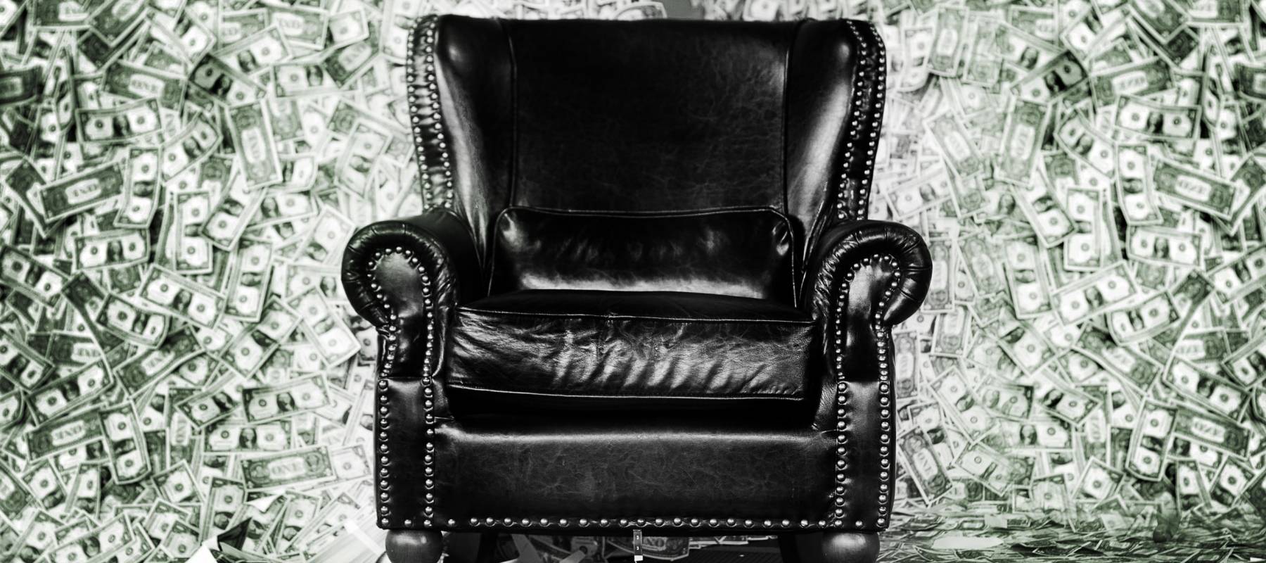 Chair surrounded by cash