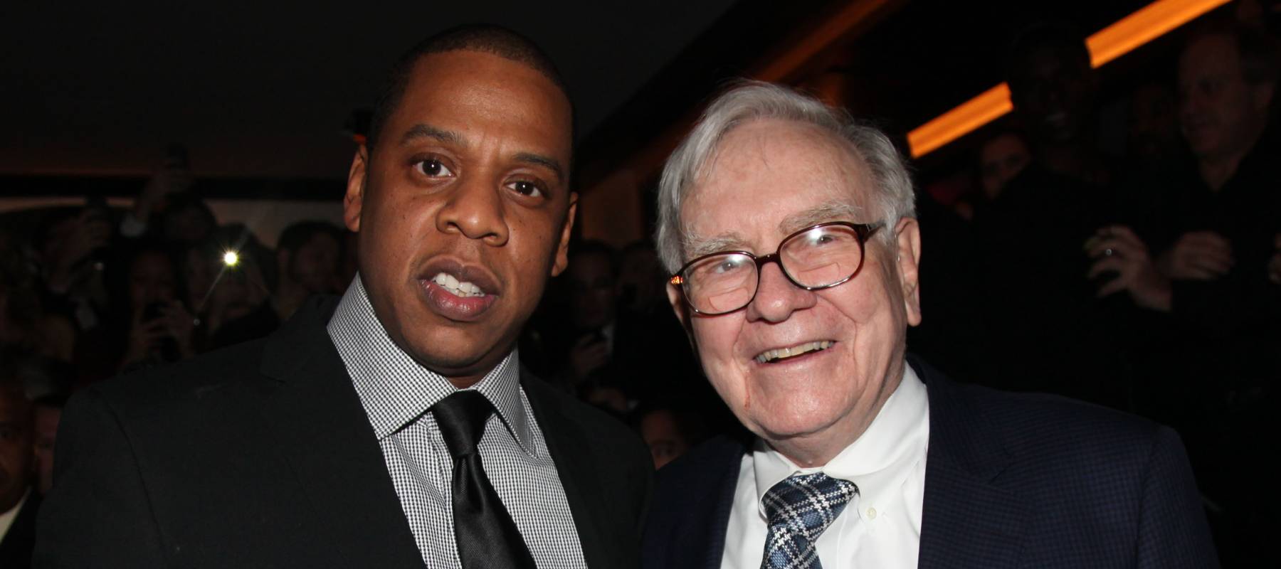 Jay-Z and Warren Buffett attend the grand re-opening of Jay-Z's 40/40 Club on January 18, 2012 in New York City.