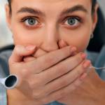 Afraid of dentist or fear of doctor. Scared and nervous patient in hospital. Upset woman with phobia having panic attack in clinic before medical operation.