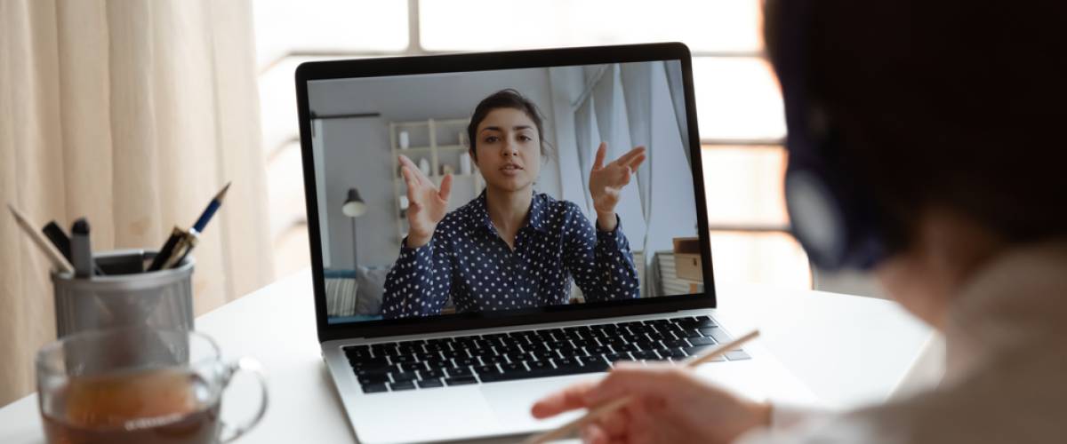 millennial girl in headphones listen watch online training or course on laptop