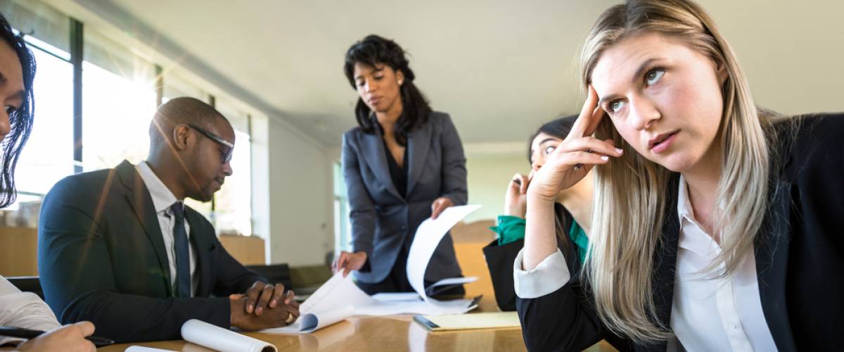 corporate female business executive passionless unexcited and unprofessional in meeting