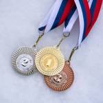 Gold silver and bronze medal, white snow background. Winter sport trophy for ski, hockey, nordic ski. Picture for winter olympic game in pyeongchang 2018