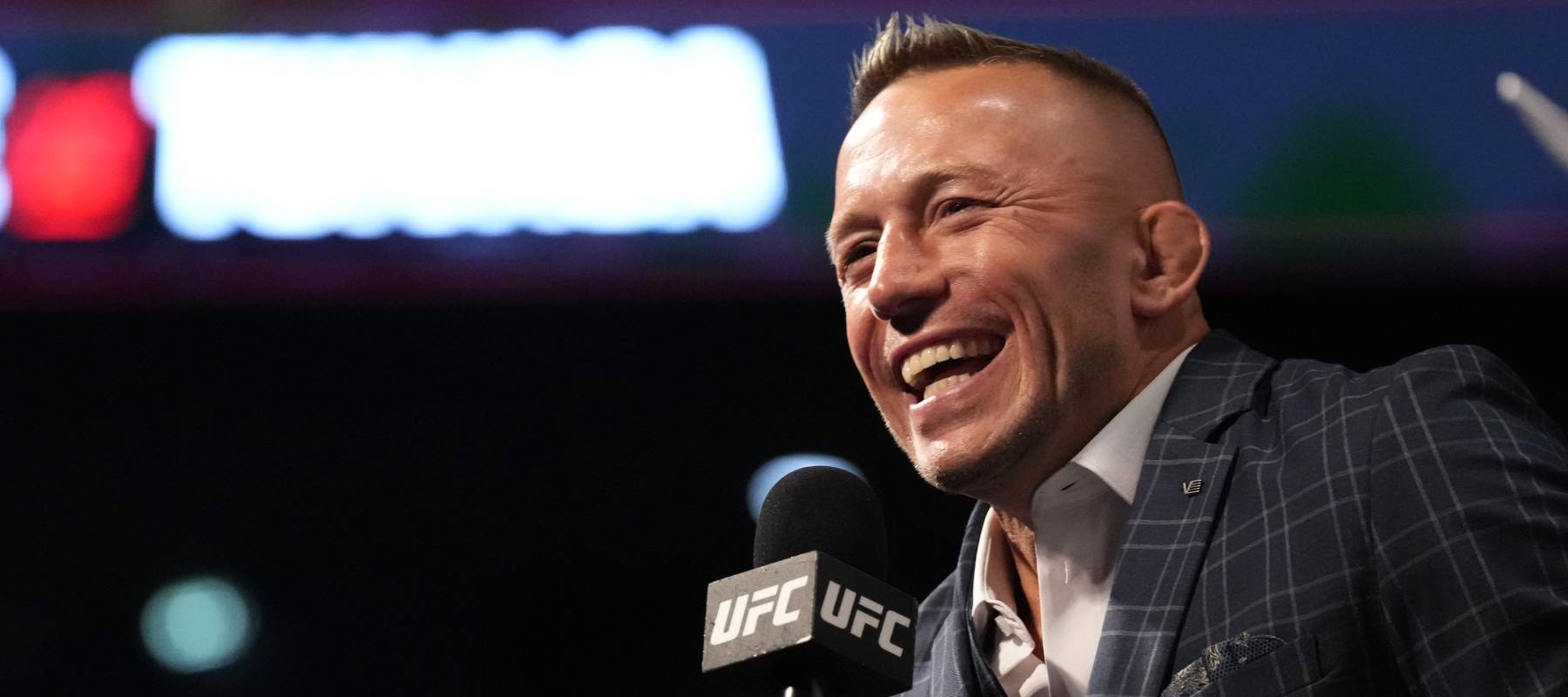 Georges St-Pierre interacts with fans during at a UFC event in Paris, France, Sept. 2, 2022.