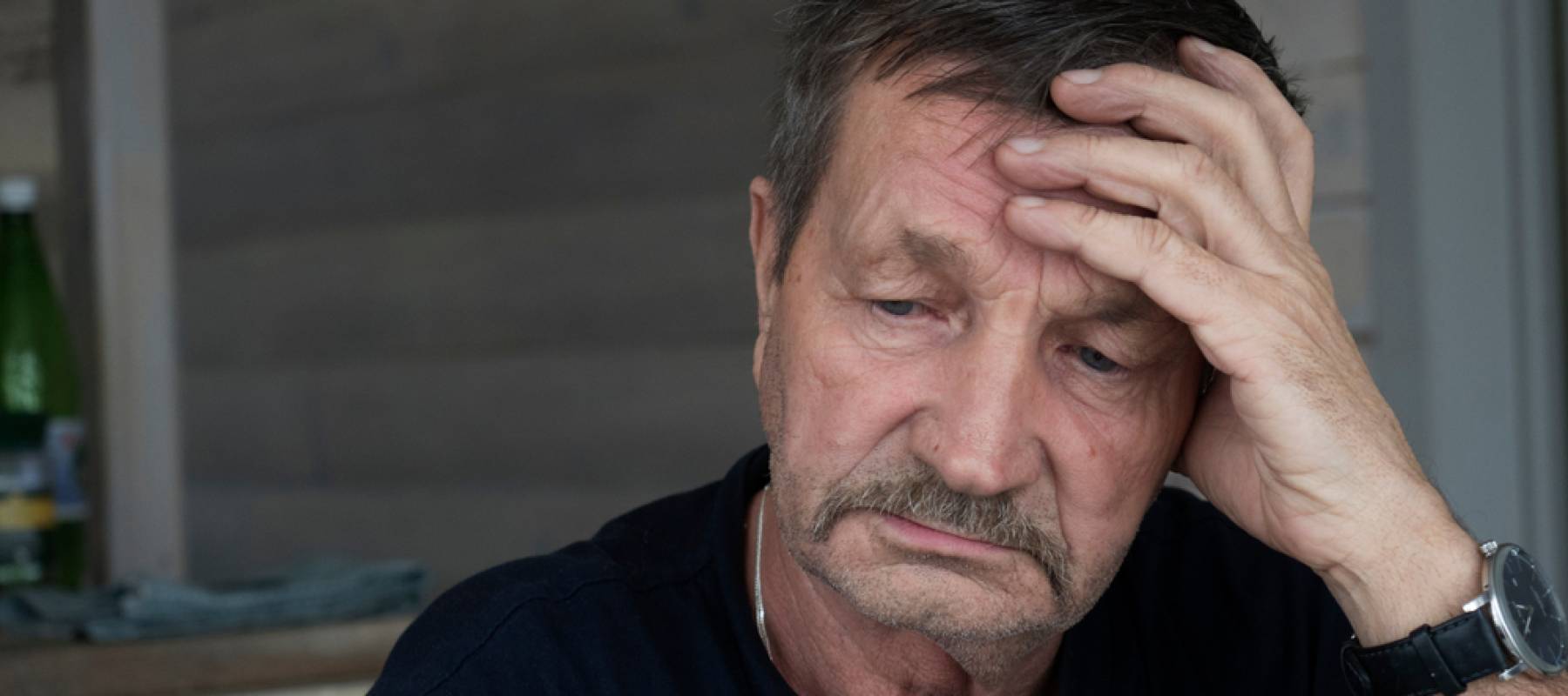Elderly sad man close-up portrait