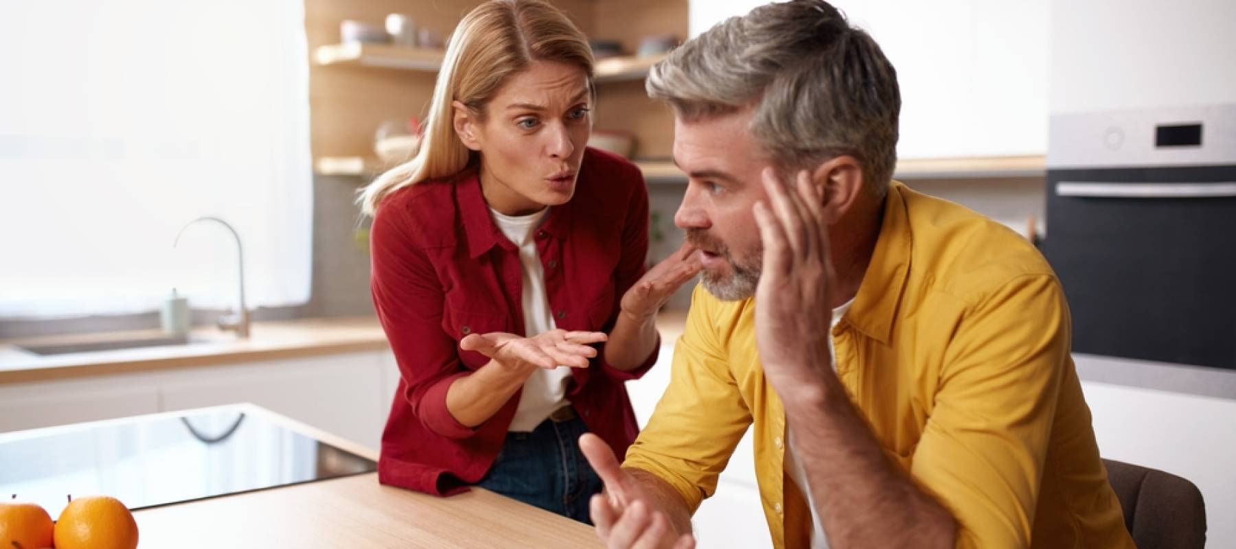 Angry wife yells at husband.