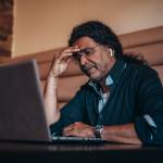 Frustrated man at computer