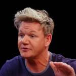 Gordon Ramsay seen speaking, holding hand up and gesturing, looking to side of the camera.