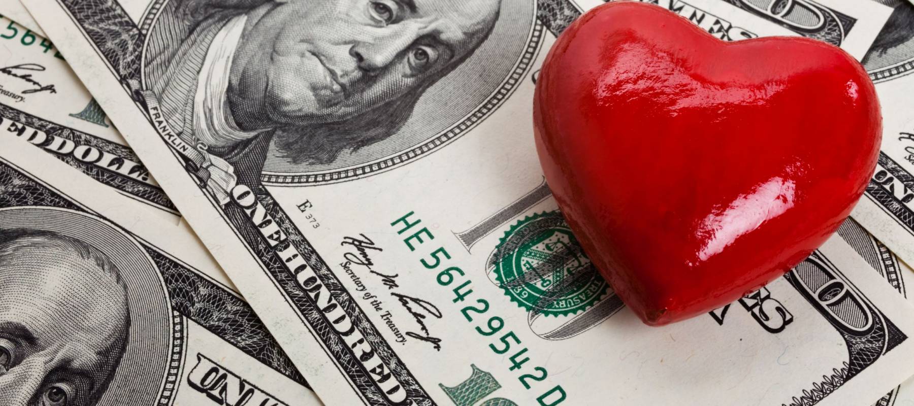 Red Heart and Hundred Dollar Bills for background
