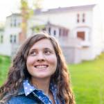 Young woman girl happy smiling homeowner in Herndon, Northern Virginia, Fairfax county residential neighborhood in spring or summer by house backyard