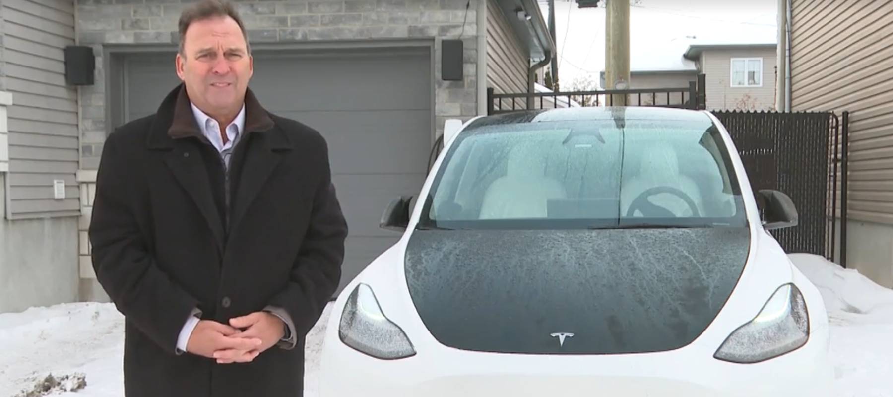 Alain Roy with his Tesla