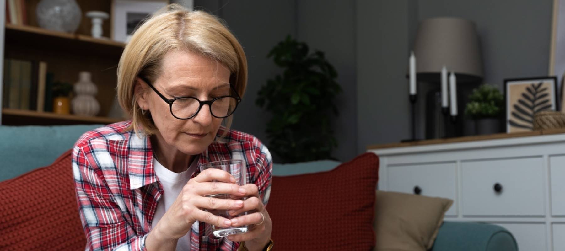 Pensive thoughtful middle aged lady