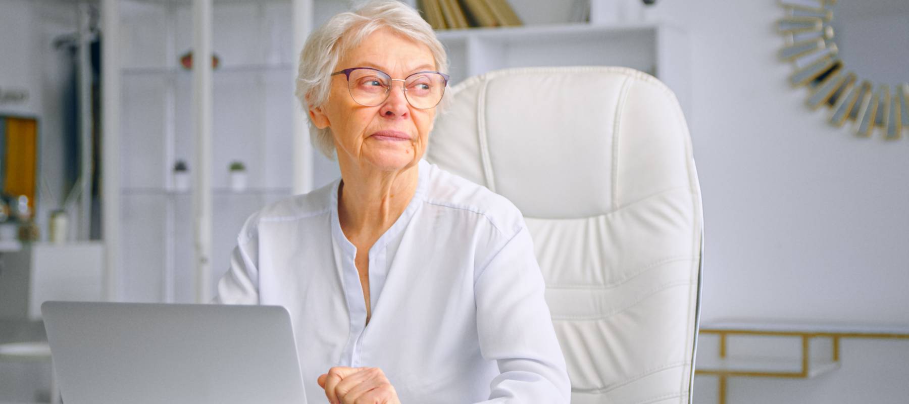 Woman thinking about something at her desk
