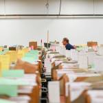 A custodian walks through tax documents in the staging warehouse at an Internal Revenue Service facility on March 31, 2022 in Ogden, Utah.