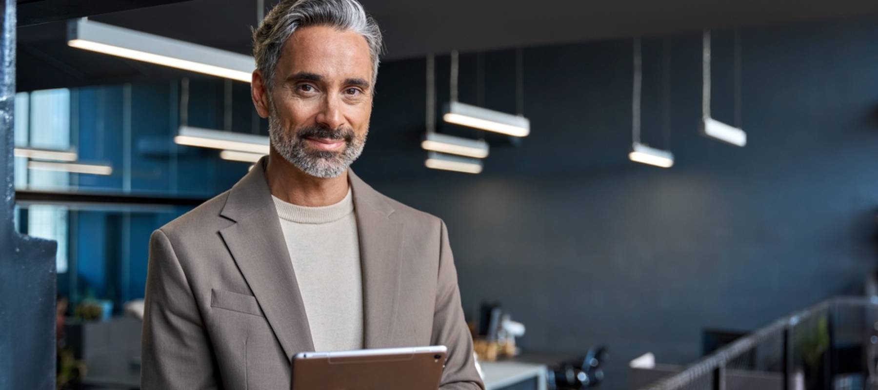 Comfortably off executive in office.