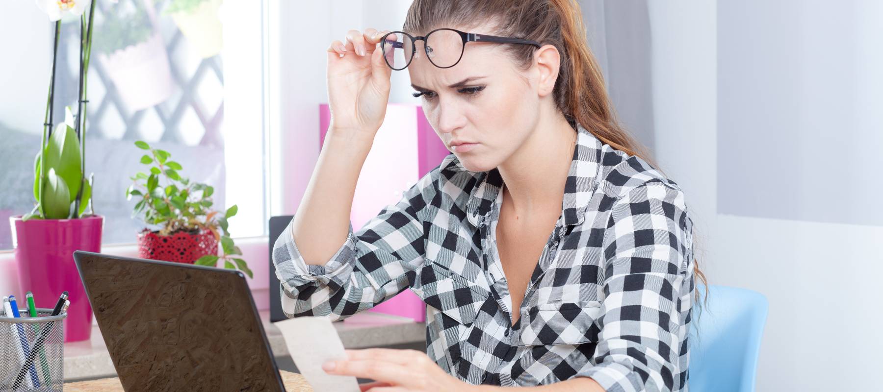 Woman looking at her bills