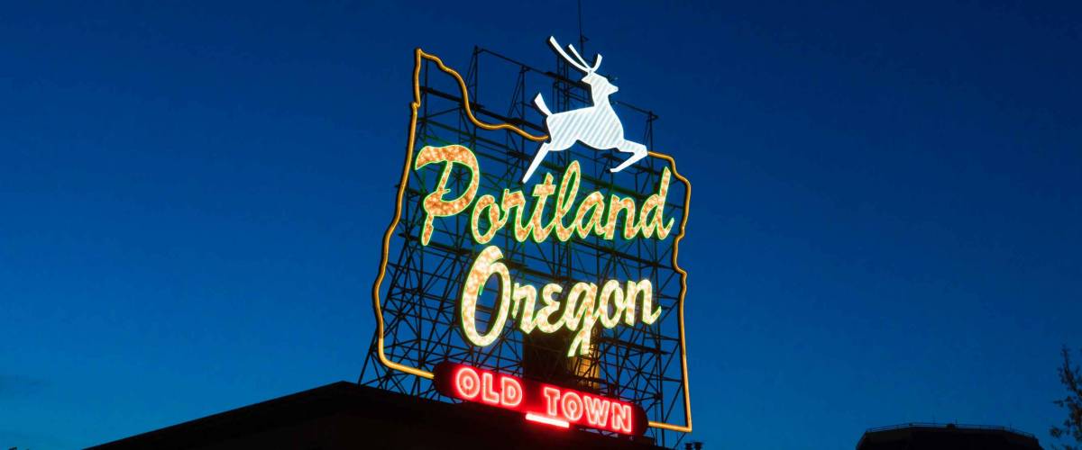 Famous Portland Oregon neon sign lit up at night