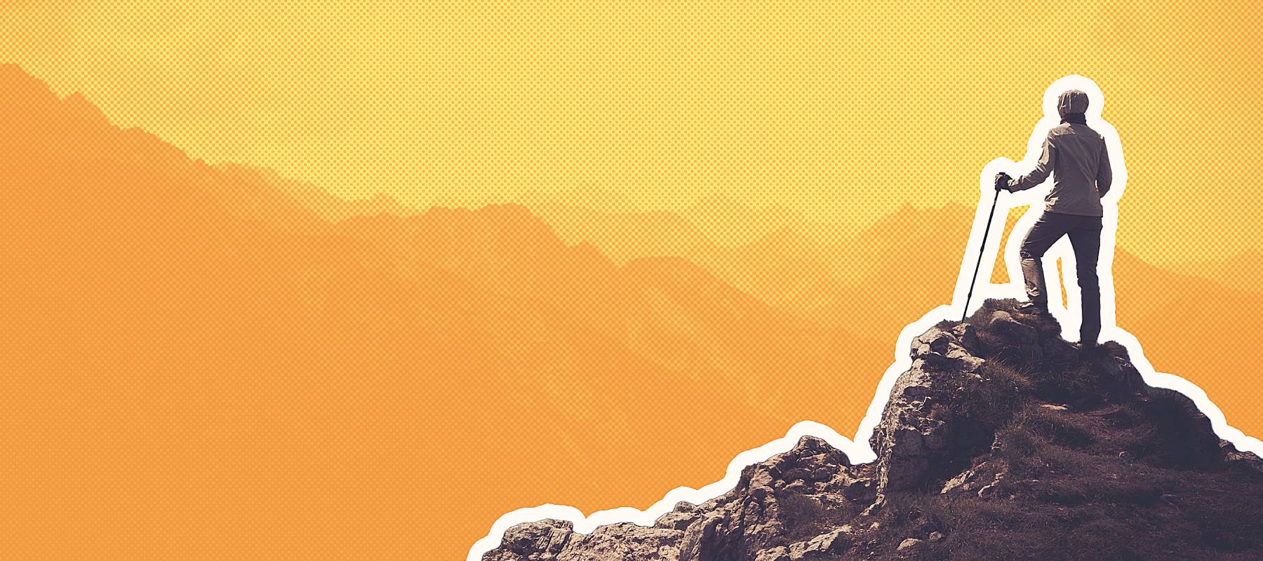 Woman hiker on a top of a mountain